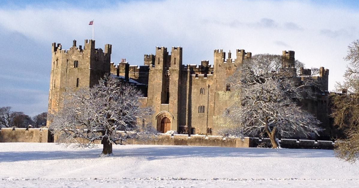 Raby Castle and deer park covered in snow